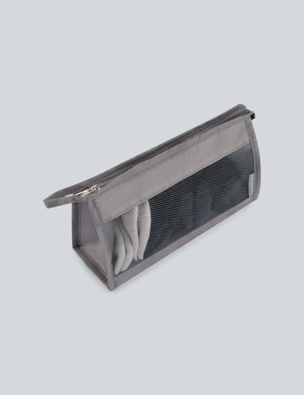Packing cubes inside suitcase showing organised packing