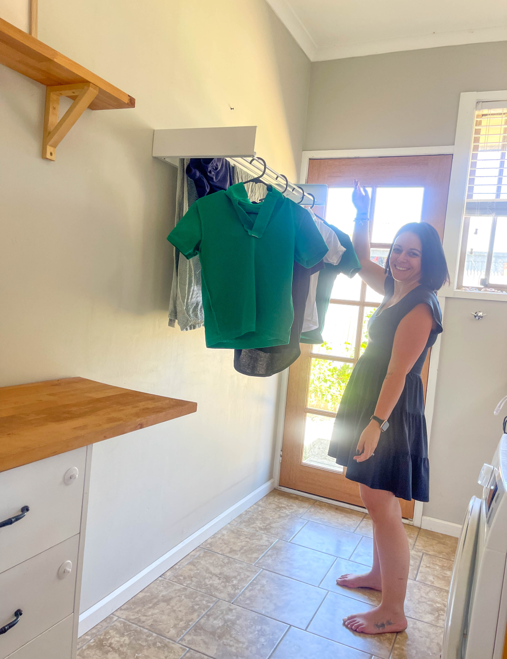 Wall mounted drying rack installed in Australian laundry